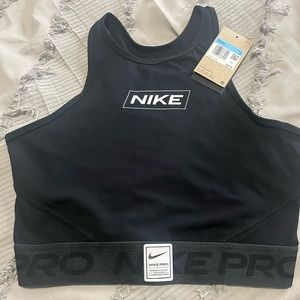 Women’s Nike pro sports bra size medium. New with tags.